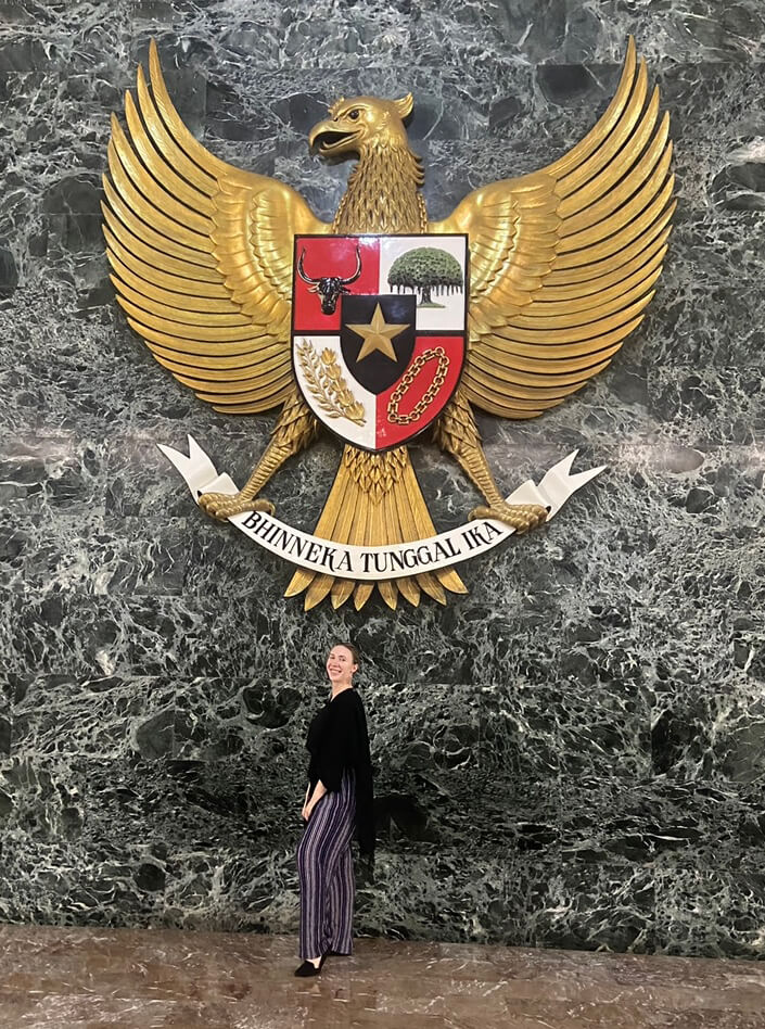 Hayley Pottle poses in front of the National Monument in Central Jakarta in the center of Merdeka Square