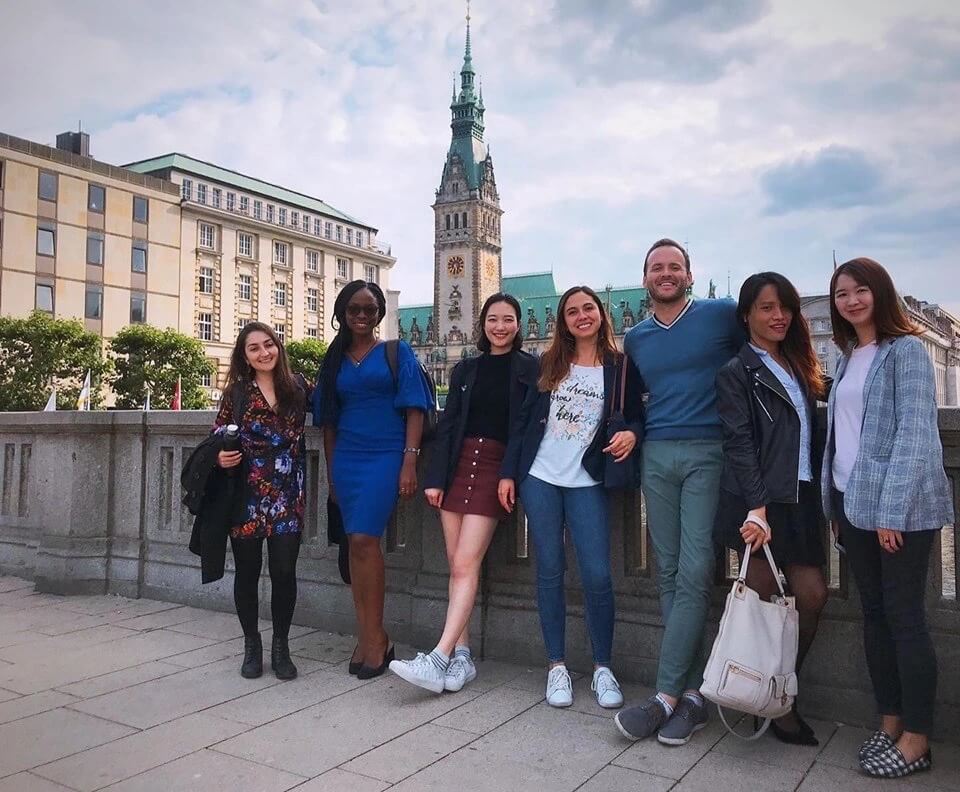 Kyle Hall photographed with colleagues in Hamburg