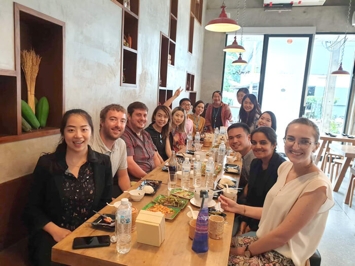 Brynn Acker and fellow interns enjoy lunch together in Bangkok