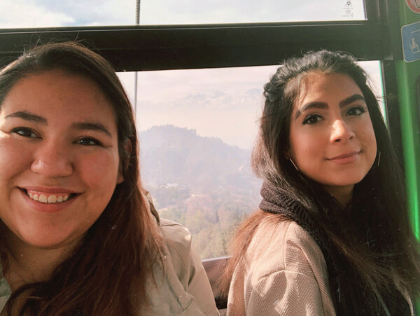 Renny poses for a photo with intern Ale from the University of Pennsylvania