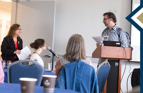 Dr. Jacobs speaks to class during Summer Institute