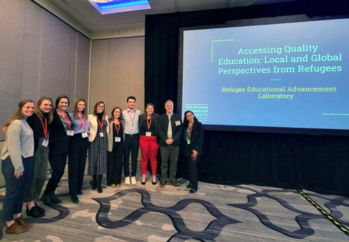 Members of the REAL Lab pose for photo after giving presentation about their book at conference titled "Accessing Quality Education: Local and Global Perspectives from Refugees"