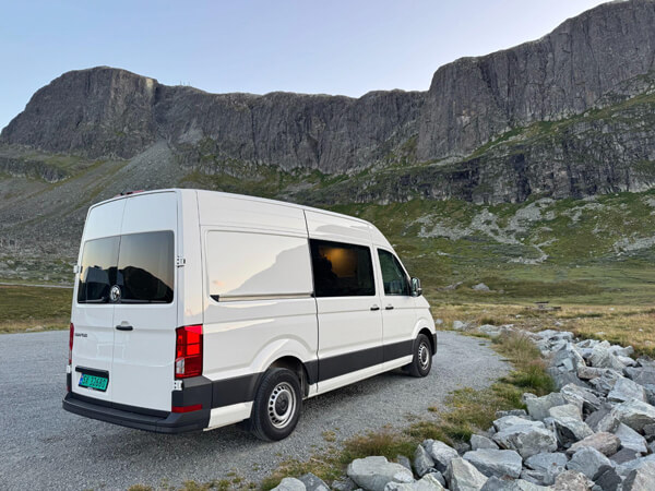 campervan on the road driving toward Aurlandsfjord