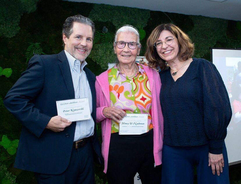 Peter Konwerski, Honey Nashman, and Amy Cohen pose for group photo with awards
