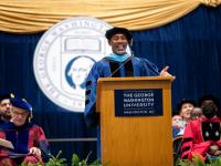 GSEHD Commencement speaker Doctor Richmond Hill speaks to the audience from behind podium | Photo Credit: Sage Russell | Senior Photo Editor 