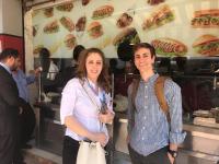 Justin poses for a photo with his colleague, Sa’eda, while waiting on their falafels after a meeting at the MoE