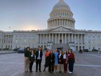 GSEHD students and alumni pose in front of the Capitol