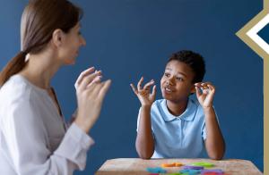 professional female practicing sign language with young student - photo credit: Freepik
