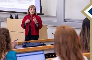 GSEHD faculty member speaks to auditorium class