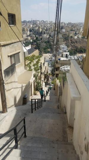 A typical set of stairs that criss cross the city taking pedestrians up the mountains the city was build on