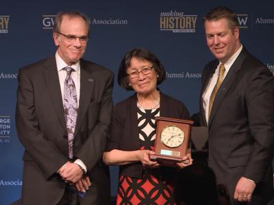 Dr. Beck (middle) poses for photo with presenters after receiving the Jane Lingo Alumni Outstanding Service Award