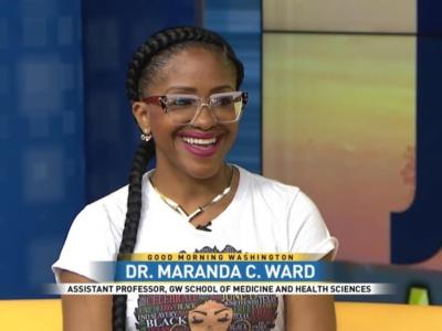 screenshot of televised news report on Good Morning Washington featuring an interview with alumna Dr. Maranda Award