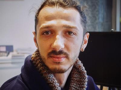 Dr. Sasha Volodarsky headshot