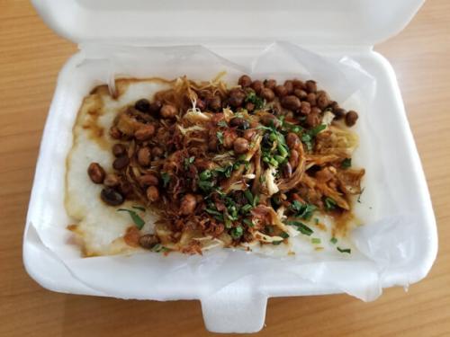 Bubur Ayam in a styrofoam takeout box