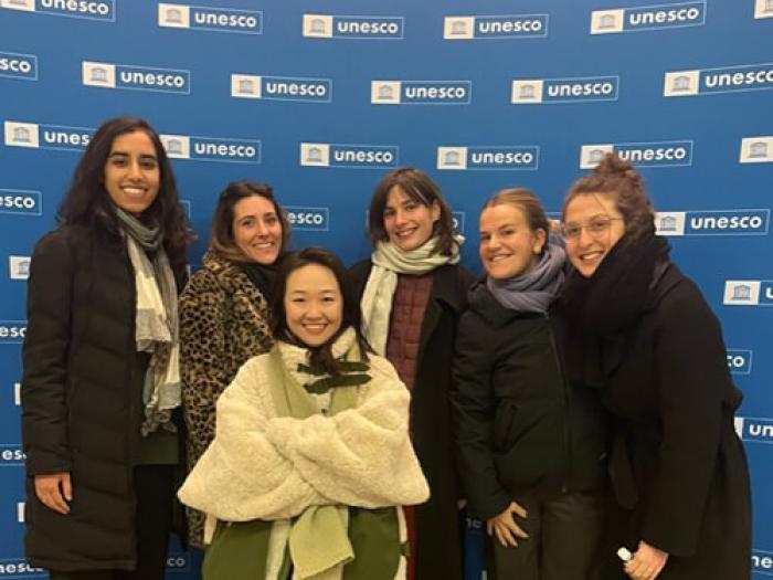 Maha Malik poses with other UNESCO interns that she has befriended