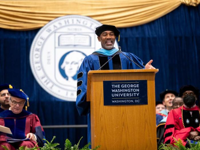 GSEHD Commencement speaker Doctor Richmond Hill speaks to the audience from behind podium | Photo Credit: Sage Russell | Senior Photo Editor 