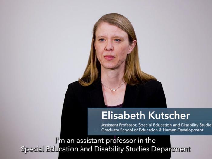 screenshot of a video featuring Elisabeth Kutscher sitting in front of a gray background. A blue bar is overlayed with her name and title "assistant professor, special education and disability studies, Graduate School of Education and Human Development"