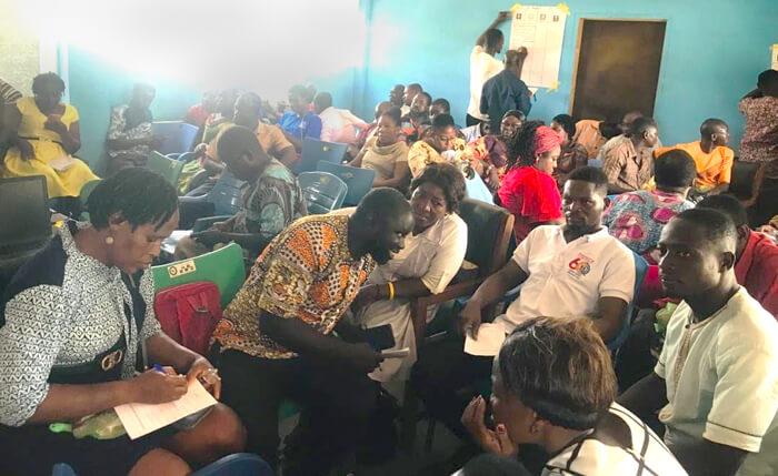 Participants at the International Inclusive Education Symposium work in groups