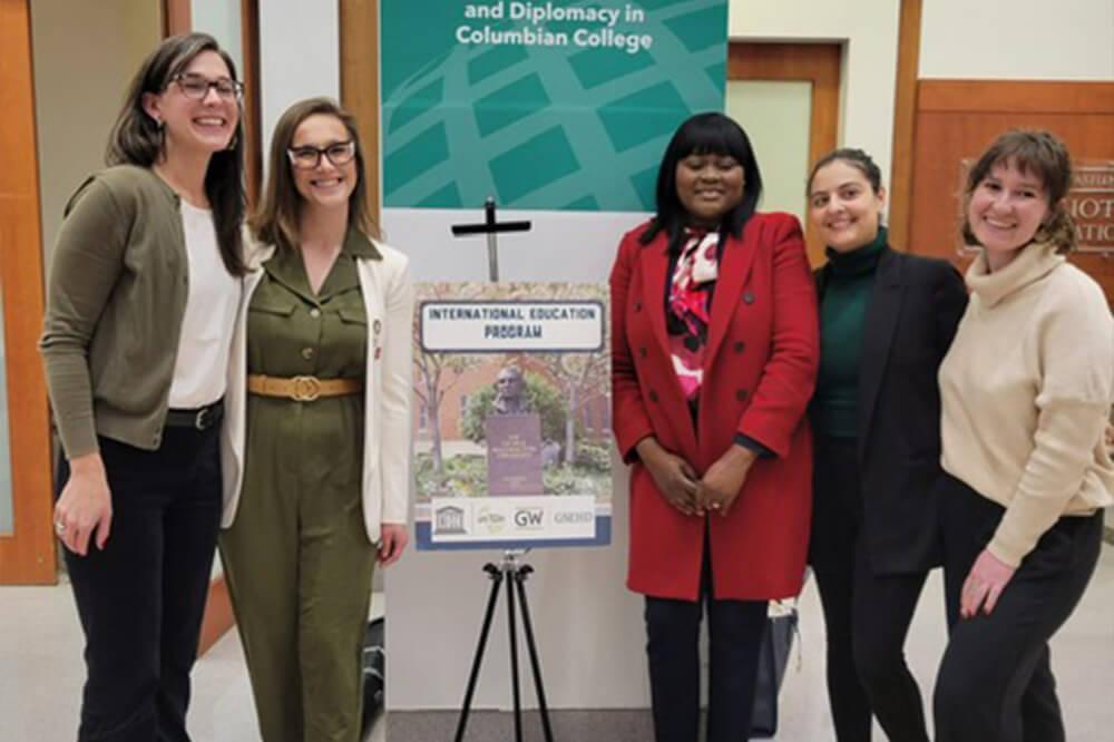 2023 GW UNESCO Fellows pose for group photo at the presentation of their experiences