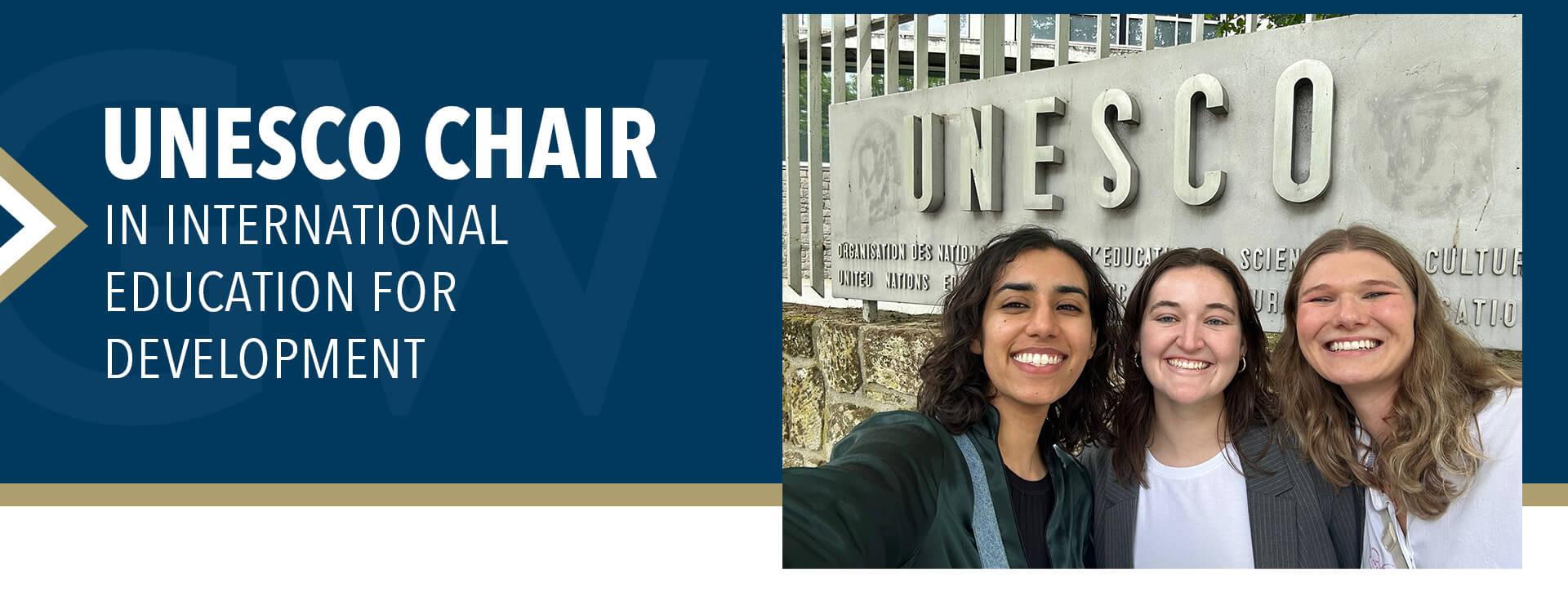 UNESCO Chair in International Education for Development - photo: three GSEHD students/alumni in front of a UNESCO sign 