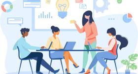 four professionals use technology to brainstorm and look at data